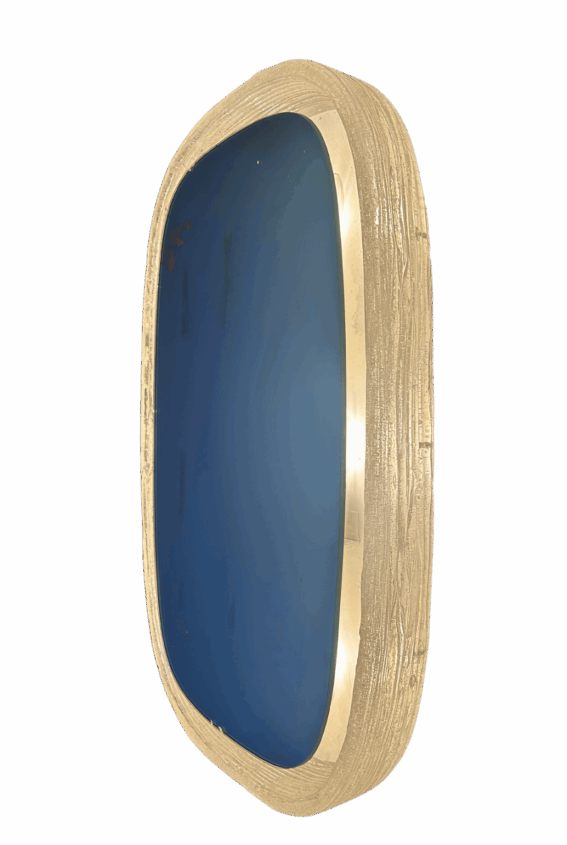 Miroir Hillebrand lumineux vintage, vue de côté – bord en relief et effet de profondeur.
