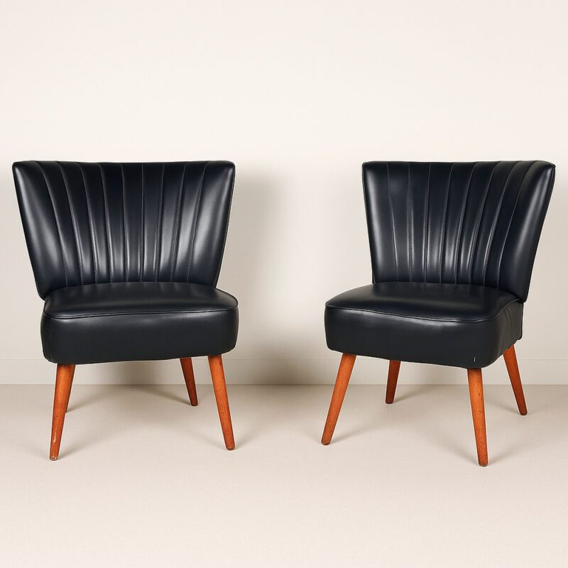 Pair of vintage club armchairs in black faux leather – 1950s